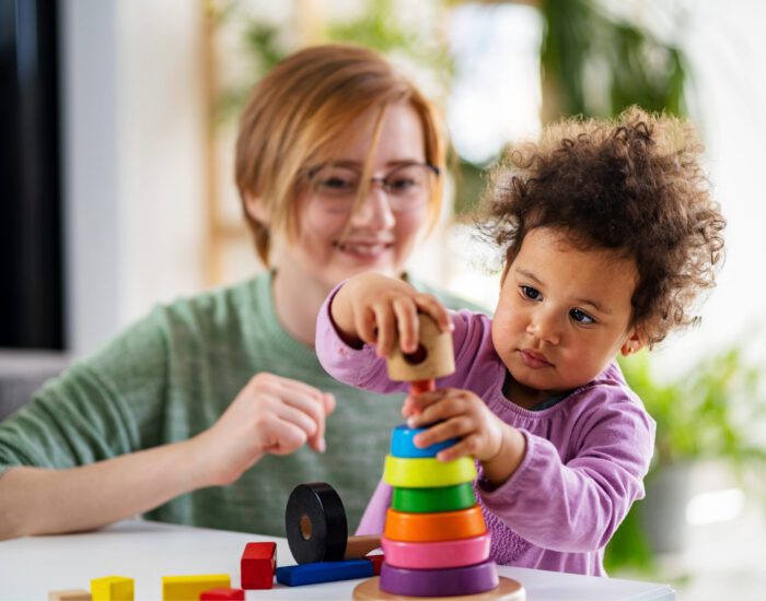 Teacher working with a child